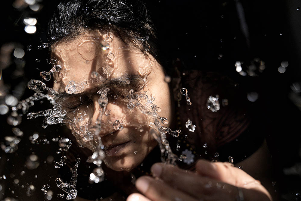 Girl washing face