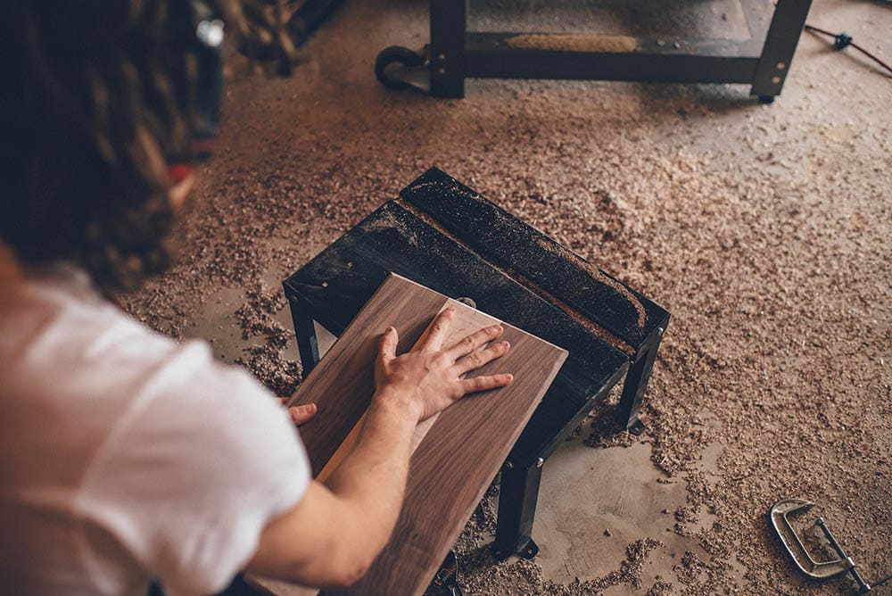 Woodworker in a workshop_Ian Schneider_Unsplash