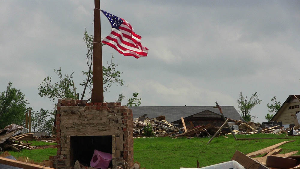 flag on a pole after tornado