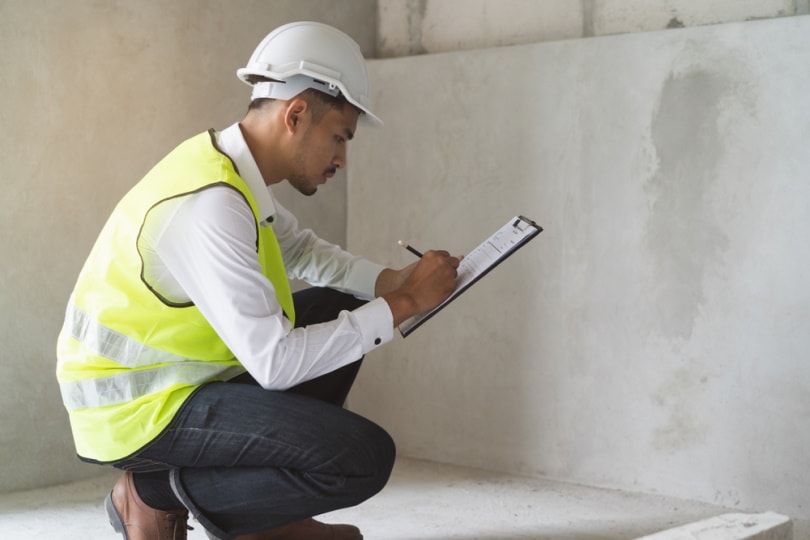 inspector checking structure