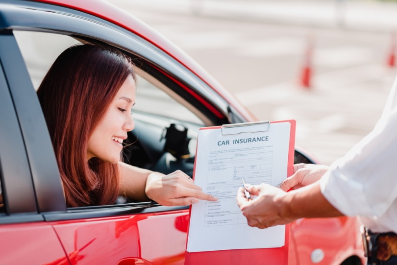 insurance agent hand over documents