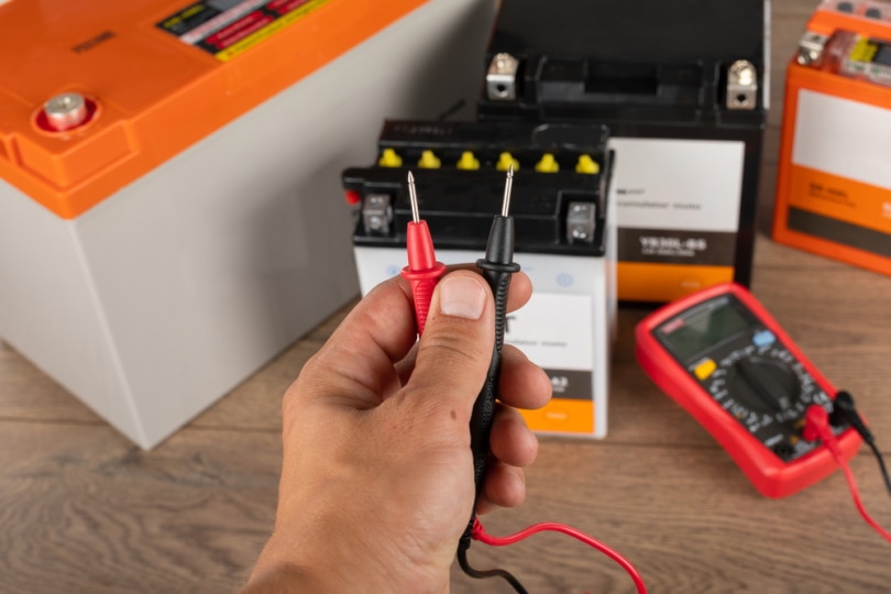 lead acid batteries on wooden table