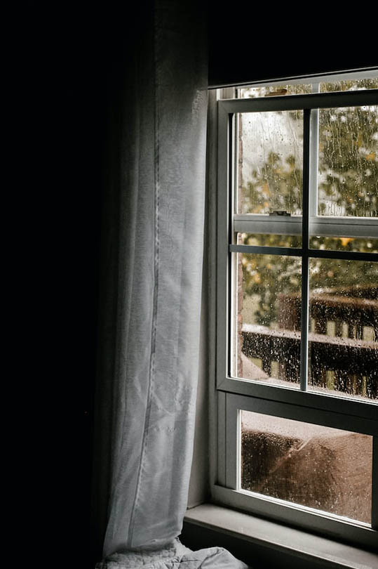 sash window on a raindy day