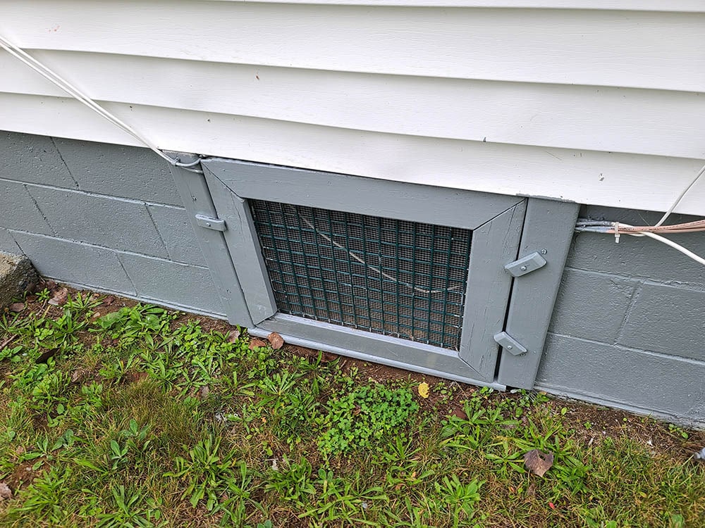 small door leading to crawl space
