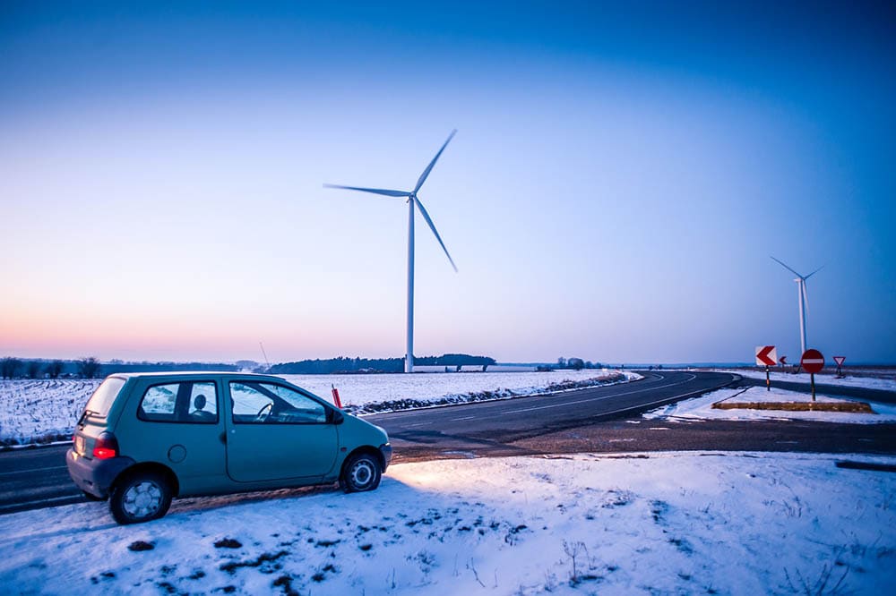 windmills on the road during winter