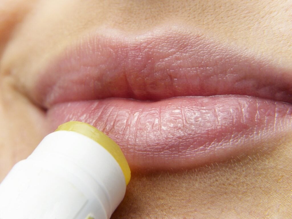 Applying lipbalm