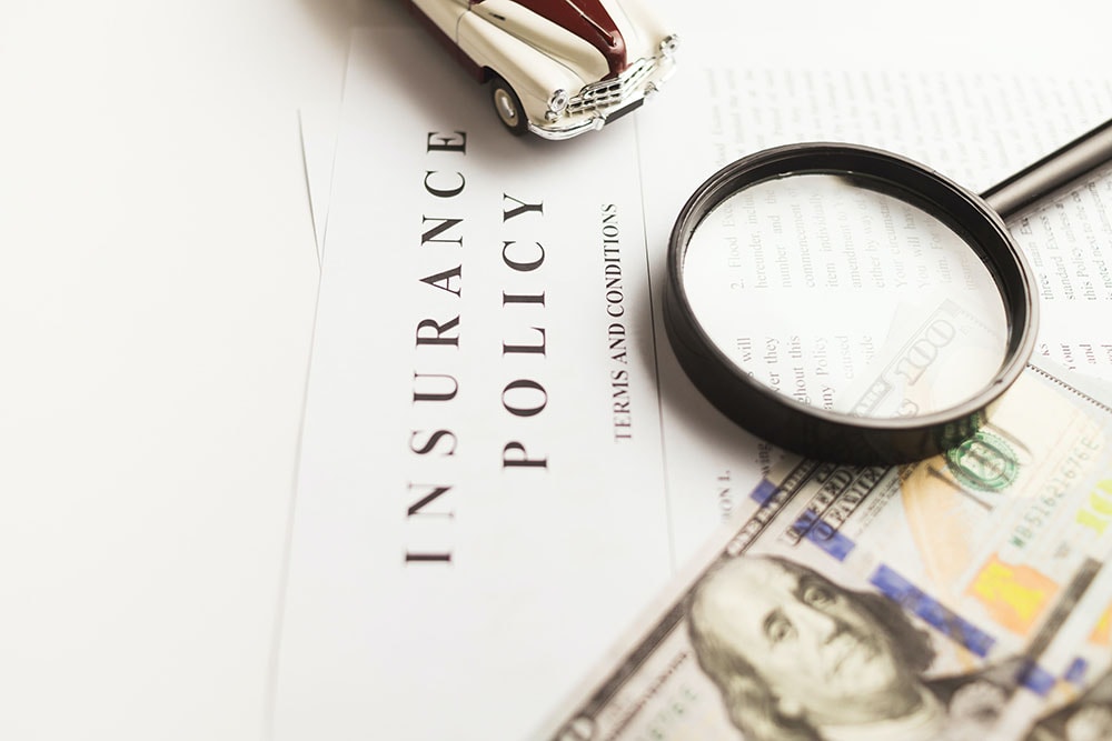 Magnifying Glass and a Insurance policy document