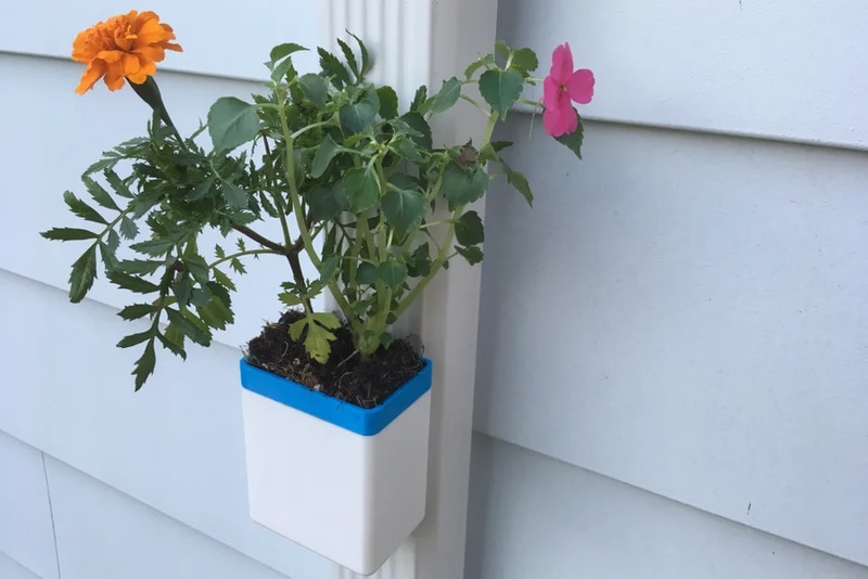 Self-watering Downspout Planter