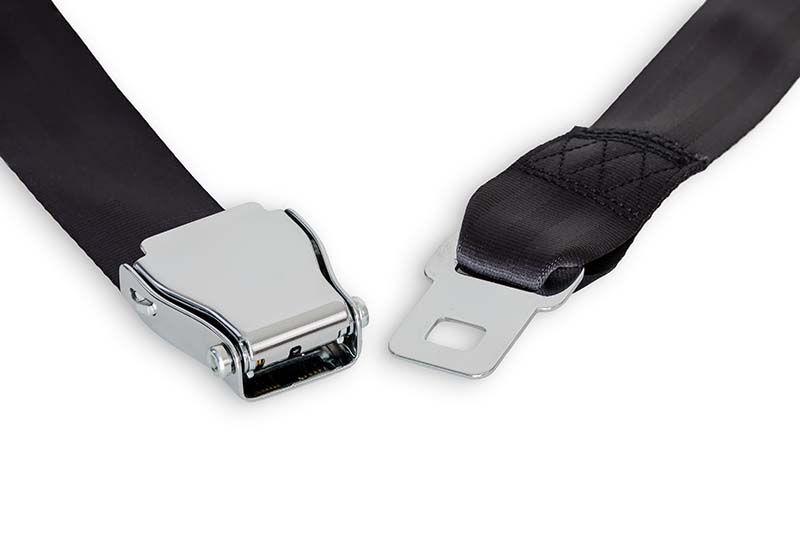 Unfastened airplane safety belt close-up isolated on white background