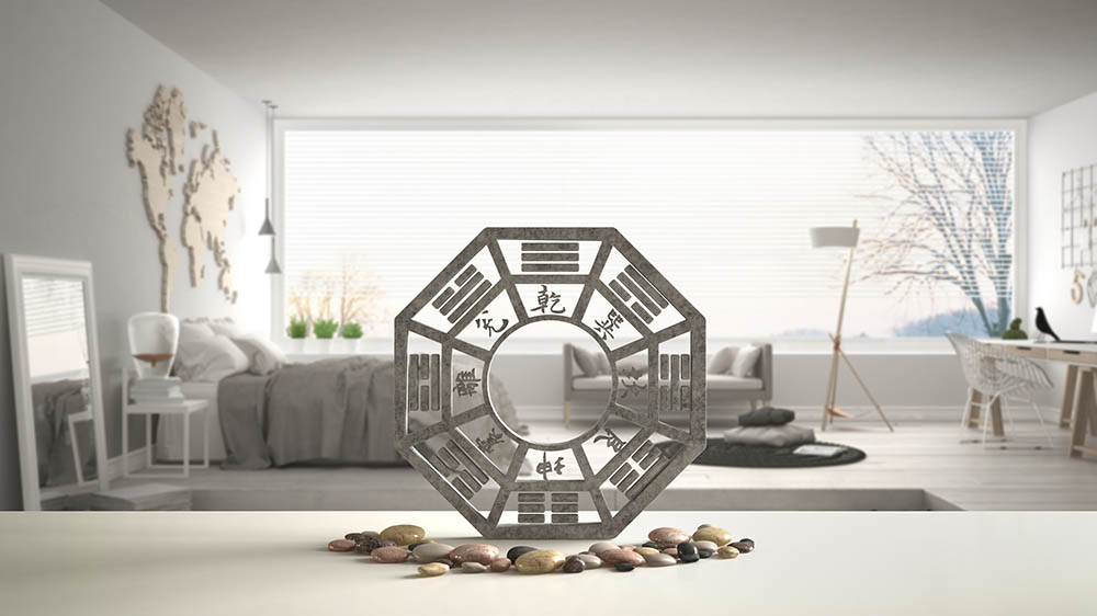 White-table-shelf-with-bagua-and-pebble-stone_Archi_Viz_Shutterstock