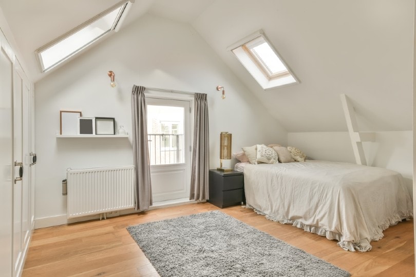 a bedroom with slanted walls