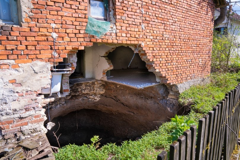 a sinkhole spotted under a house after an earthquake