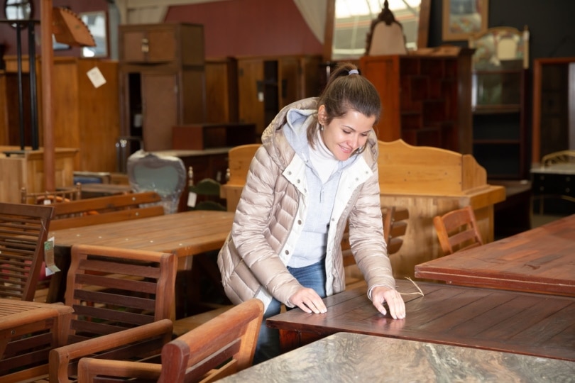 woman choosing dinning table