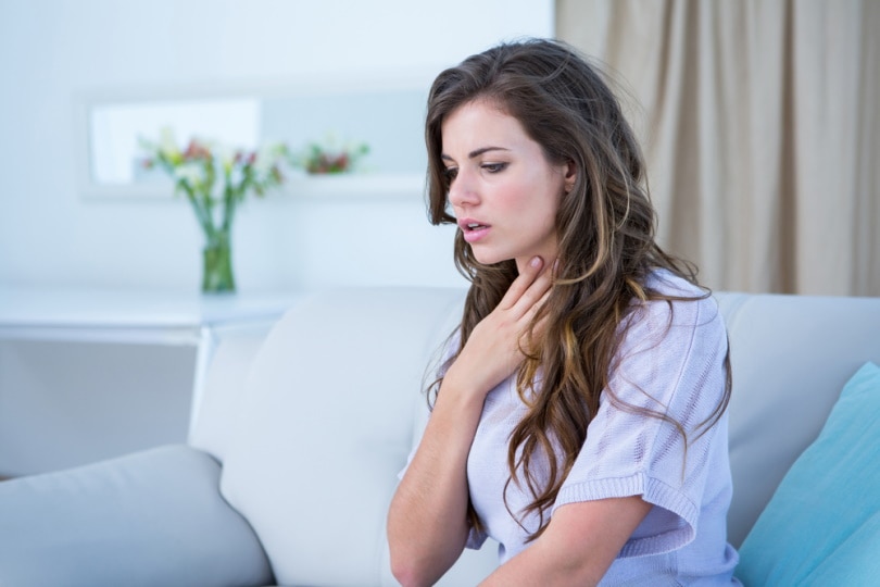 woman having asthma attack