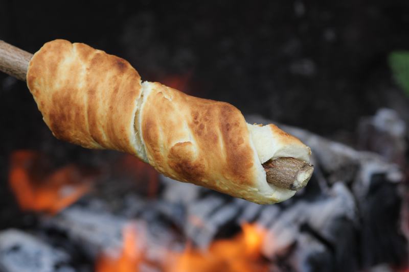 Baking Bread in a Open Fire