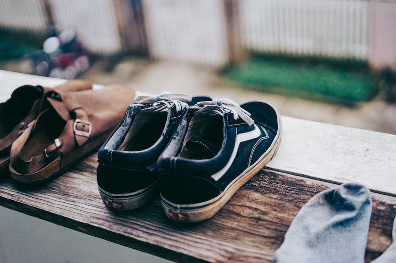 Drying Shoes on a wood surface