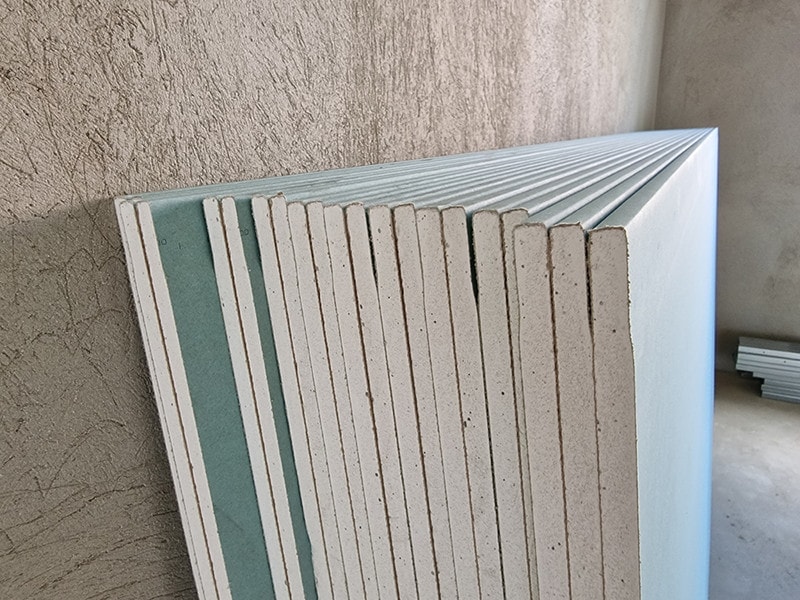 Stack of Green Board Drywall