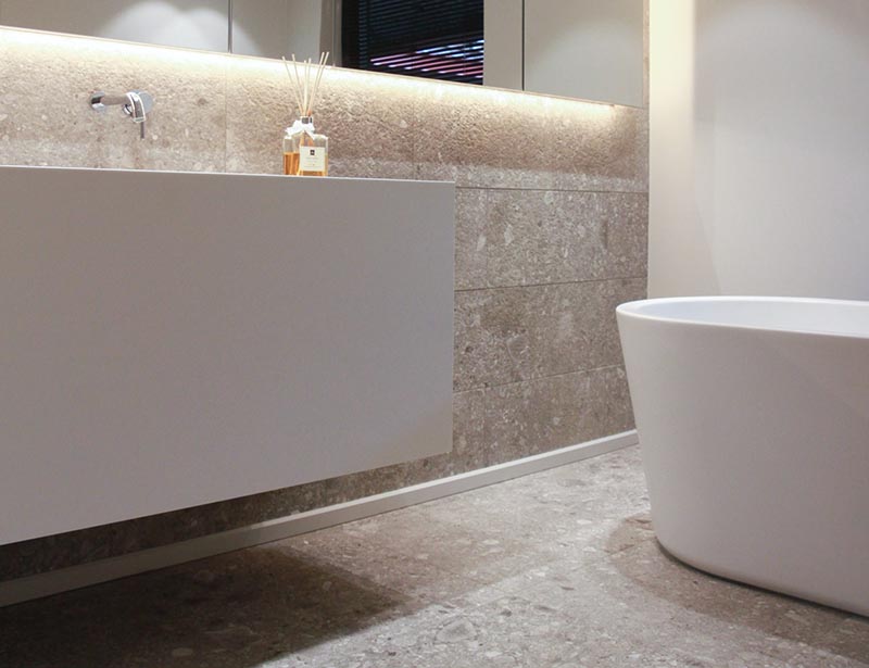 bathroom with travertine tiles