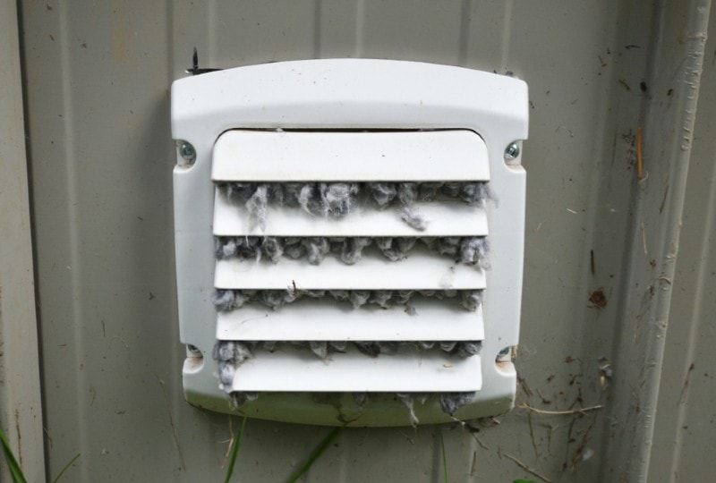 close up of a dirty dryer vent