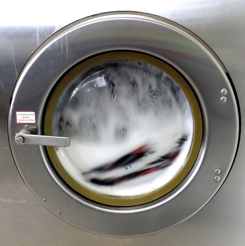 close up washing machine with water