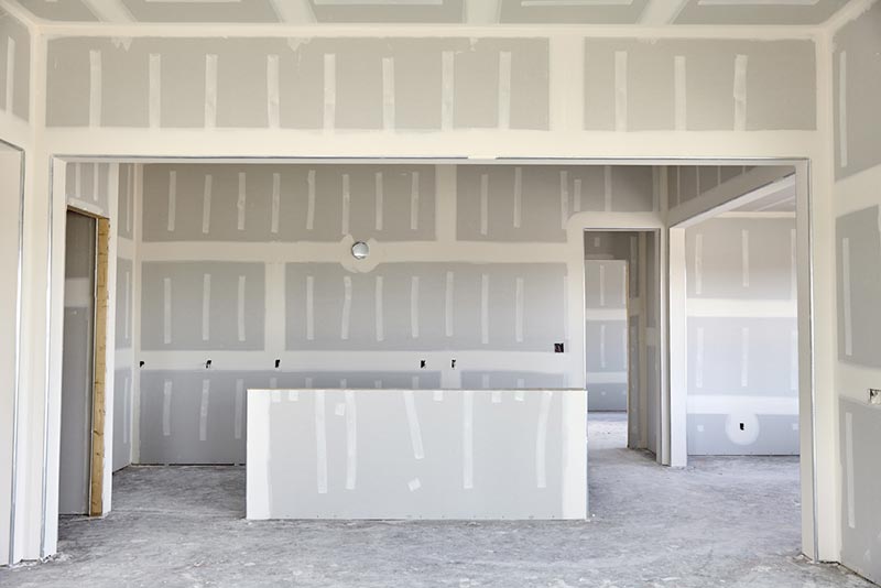 drywall mud and tape finish in a new home construction