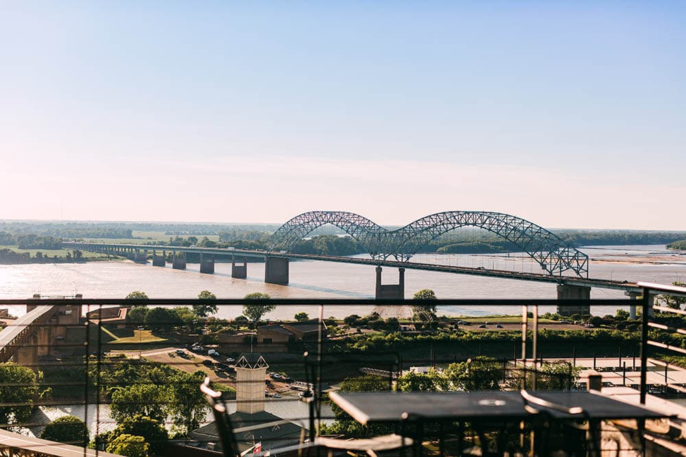 gray metal bridge downtown memphis tn