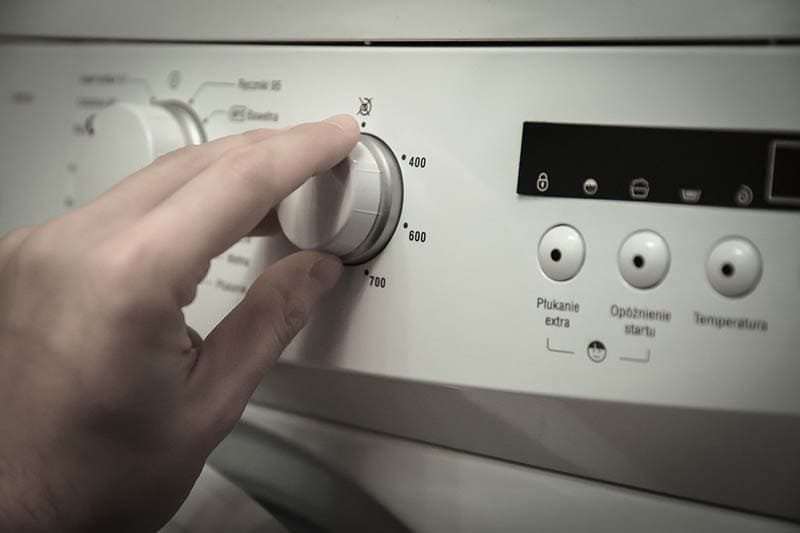 hand changing washer settings