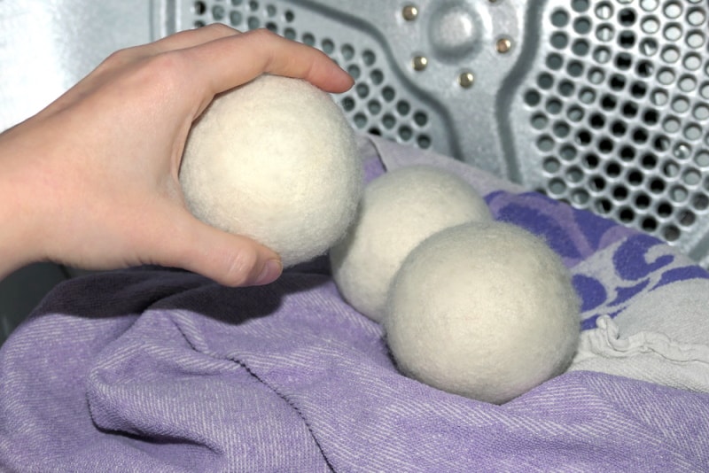 hand holding wool dryer ball