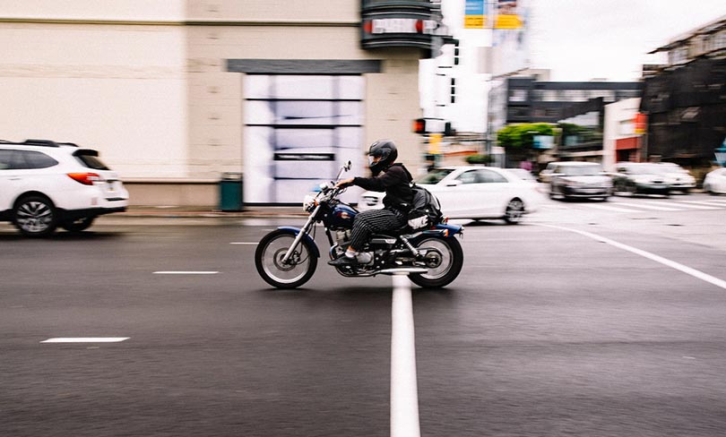 man riding a motorcycle