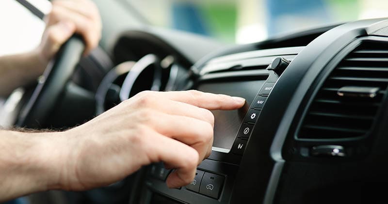 Man using car dashboard