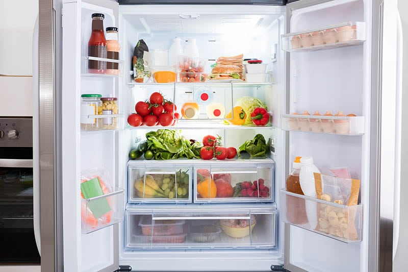 open refrigerator filled with food