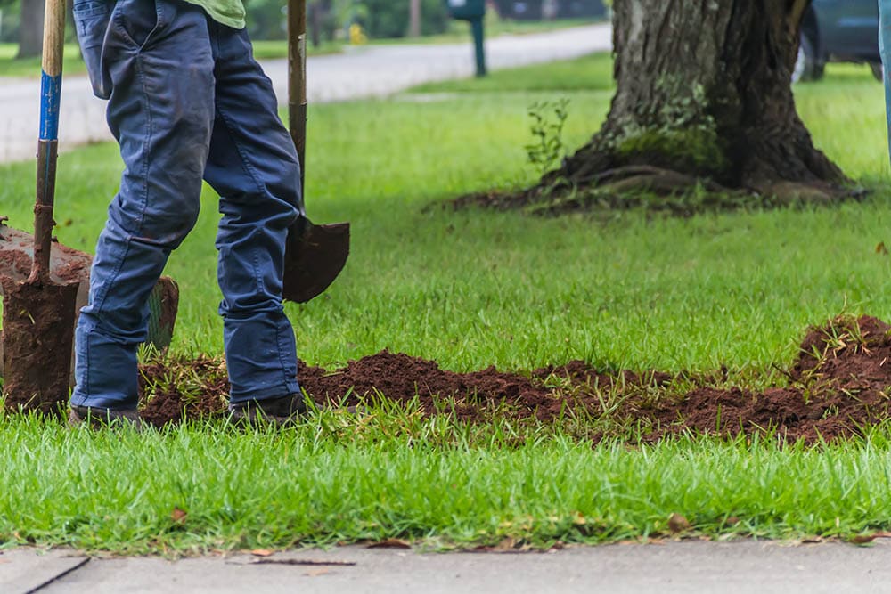 person digging trench