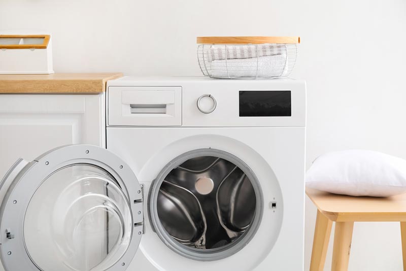 pillow near a washing machine