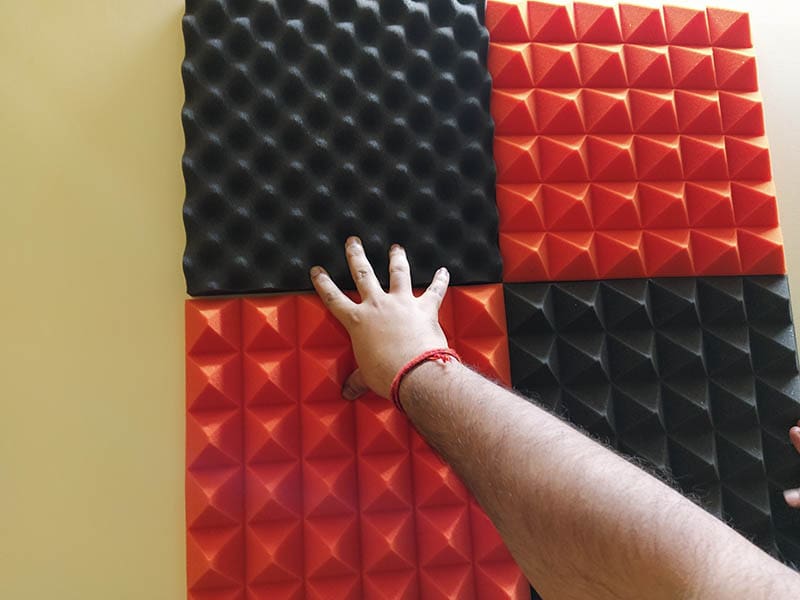 red and black acoustic foam or panel