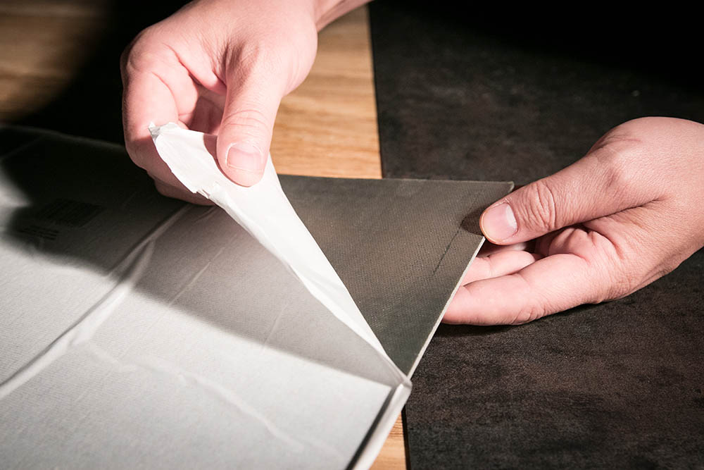 removing paper back from peel and stick tile