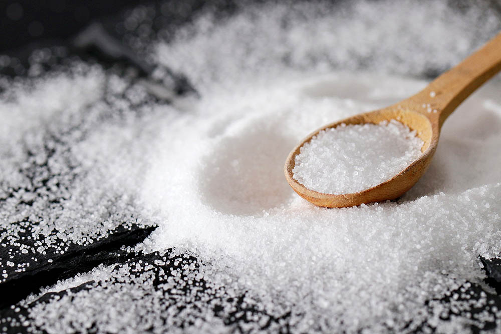 salt on a wooden spoon