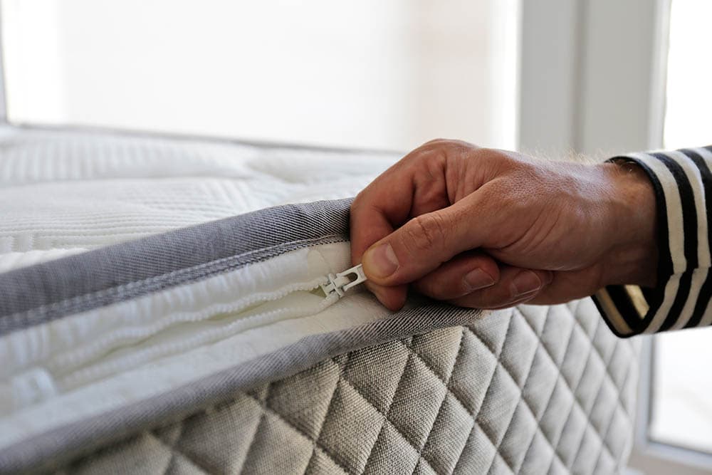unzipping a mattress