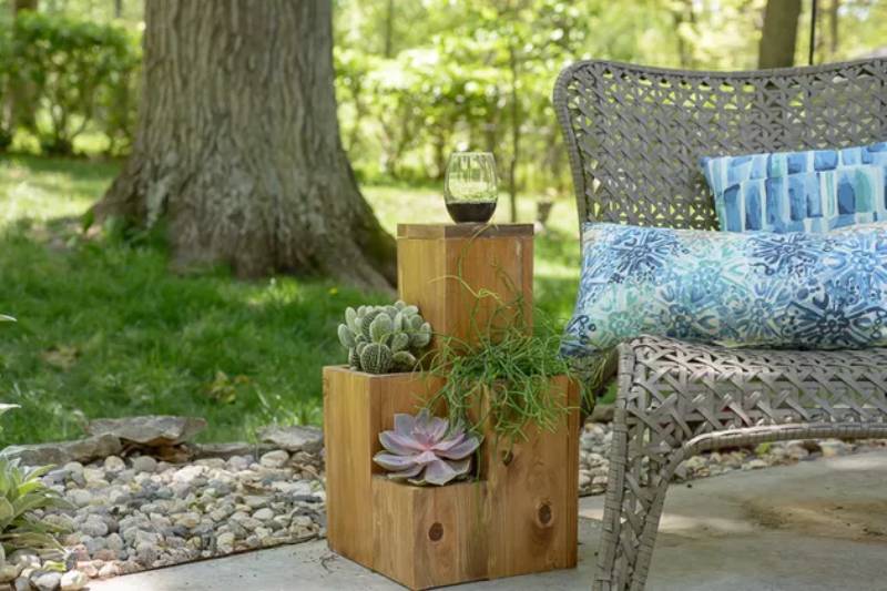 DIY side table atop a small garden