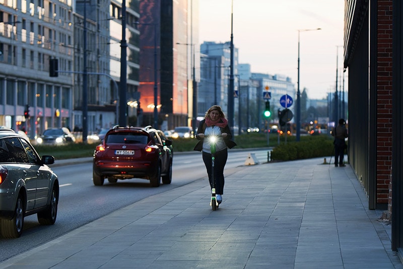 Electric Scooter Woman Riding
