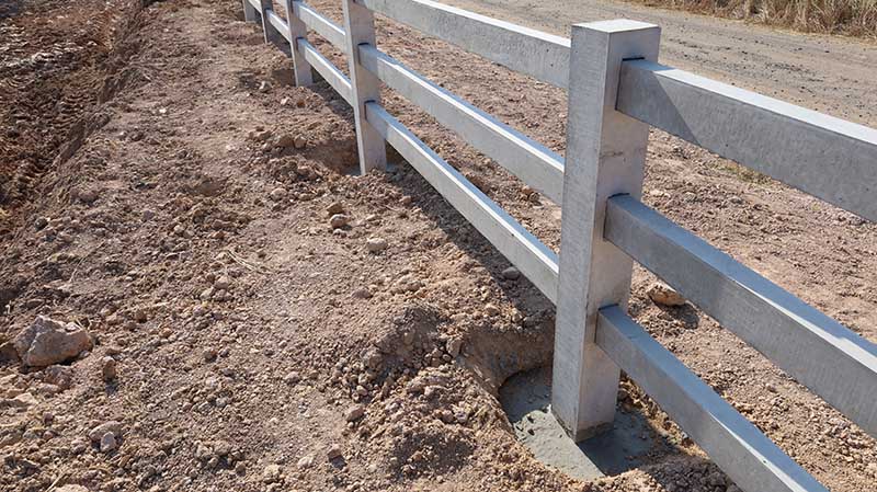 Fence posts and concrete bases
