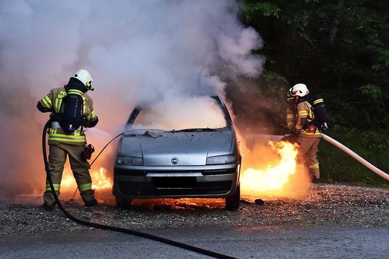 Fire-fighters extinguisher car fire