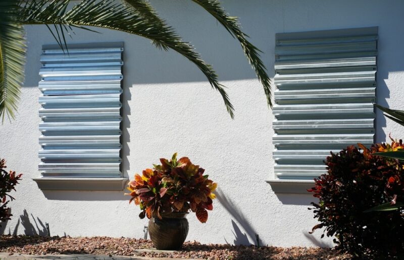 Home prepares for hurricane by putting up storm shutters