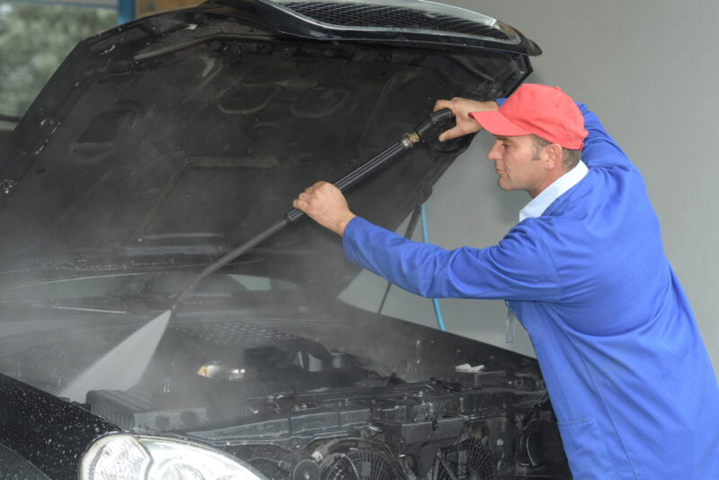 Man power wash engine bay