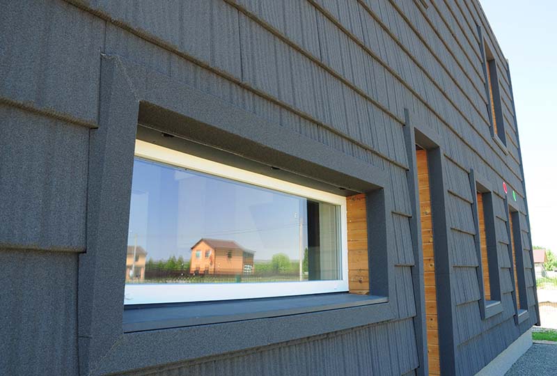 Modern passive house with energy efficient siding, passive house walls