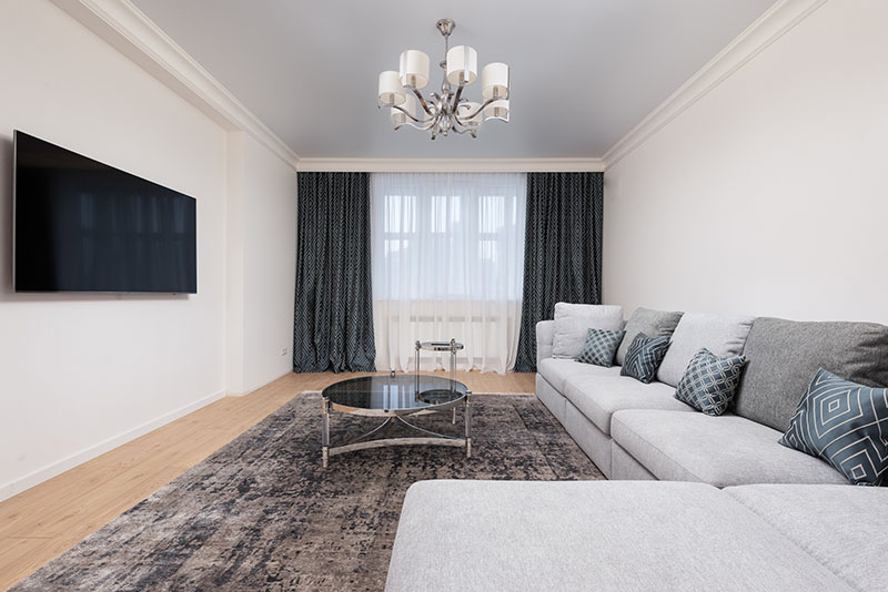 Modern room interior with a wall mounted TV