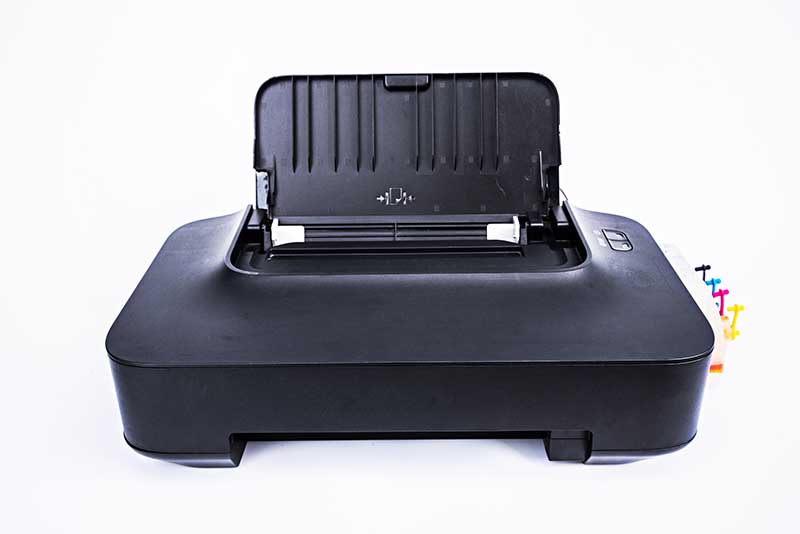 Old printer with ink tank