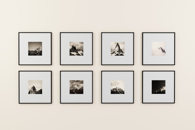 Series of frames on a white wall