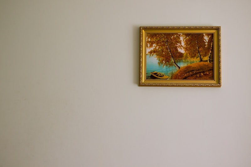 Small picture frame on a large wall