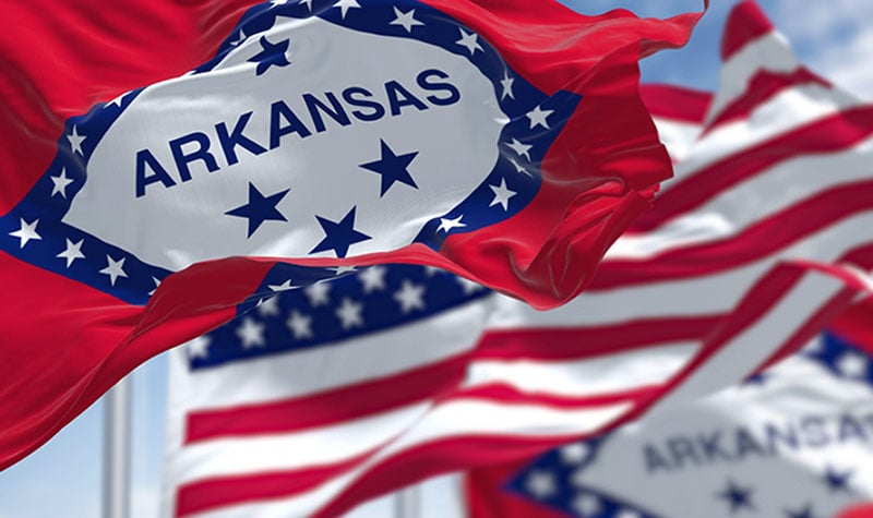 The flags of the Arkansas state and United States