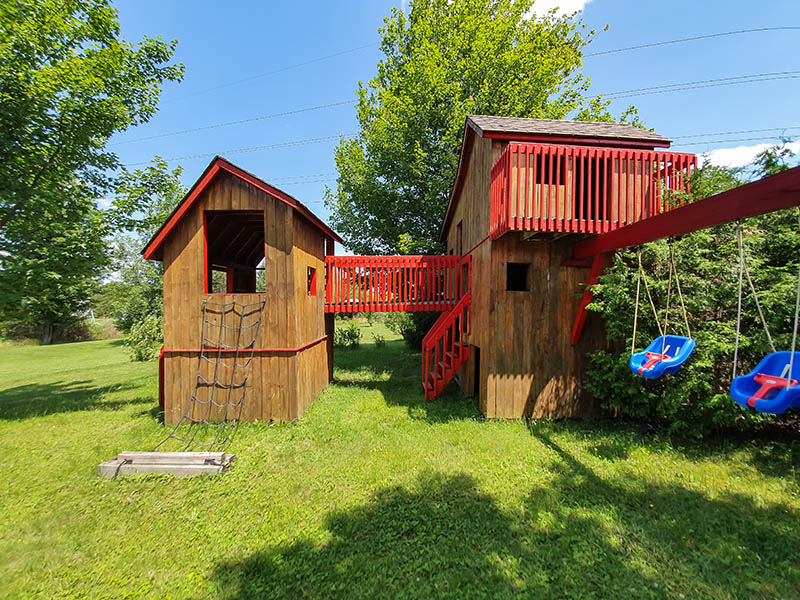 Wide angle shot of a big play area for children entirely made in wood